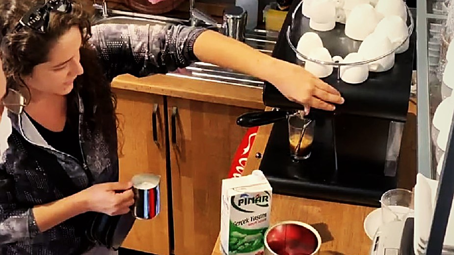 Pouring an espresso shot